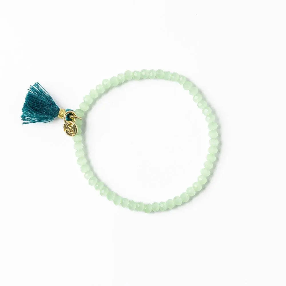 Patsy Solid Crystal Stretch Bracelet With Tassel Mint INK + ALLOY