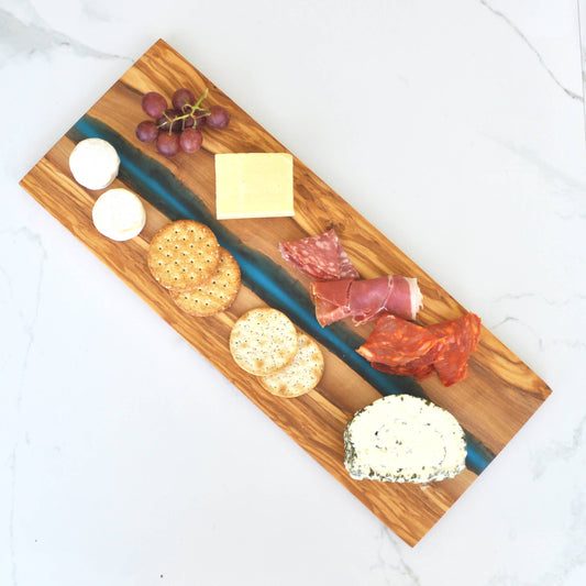 Olive Wood Cutting Board with River of Blue Resin - 15” x 6” Naturally Med Inc.