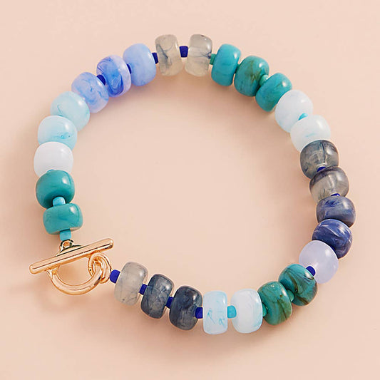 Ombre Flat Round Shaped Beads Stretch Bracelet Sensibling Corp.