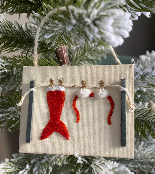 Christmas mermaid on clothesline